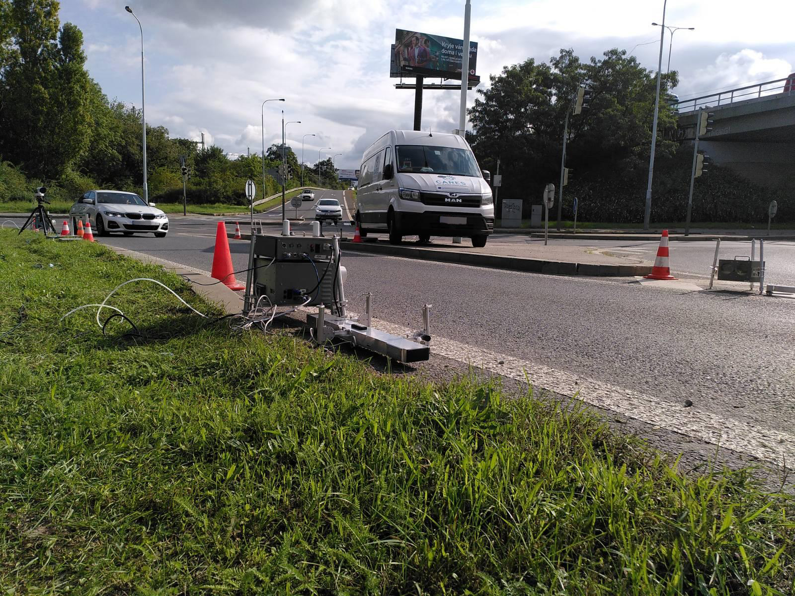 Cars in Prague passing in front of Opus Remote Sensing device